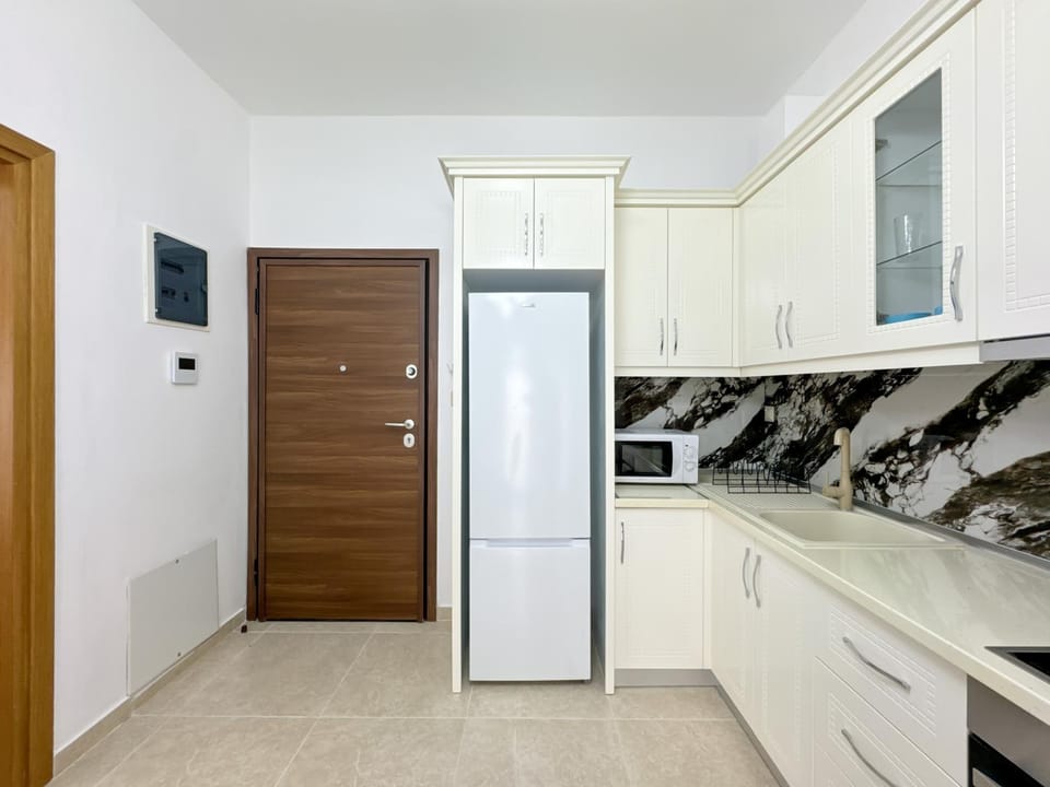Kitchen or kitchenette, oven, stove