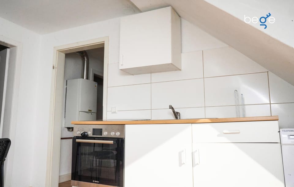 Kitchen or kitchenette, oven, stove