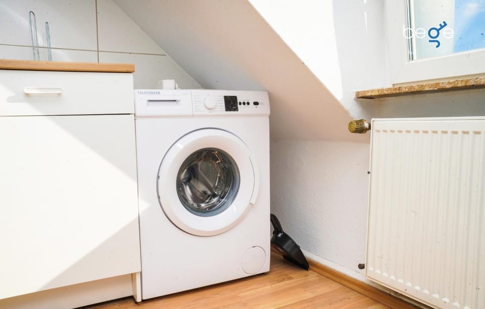 Kitchen or kitchenette, washing machine