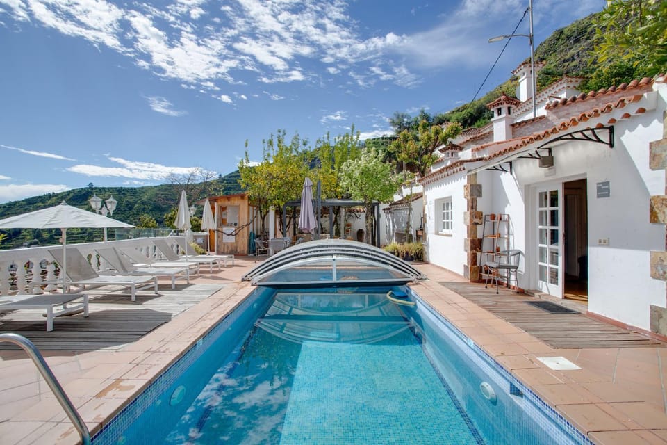 Property building, Living room, Swimming pool