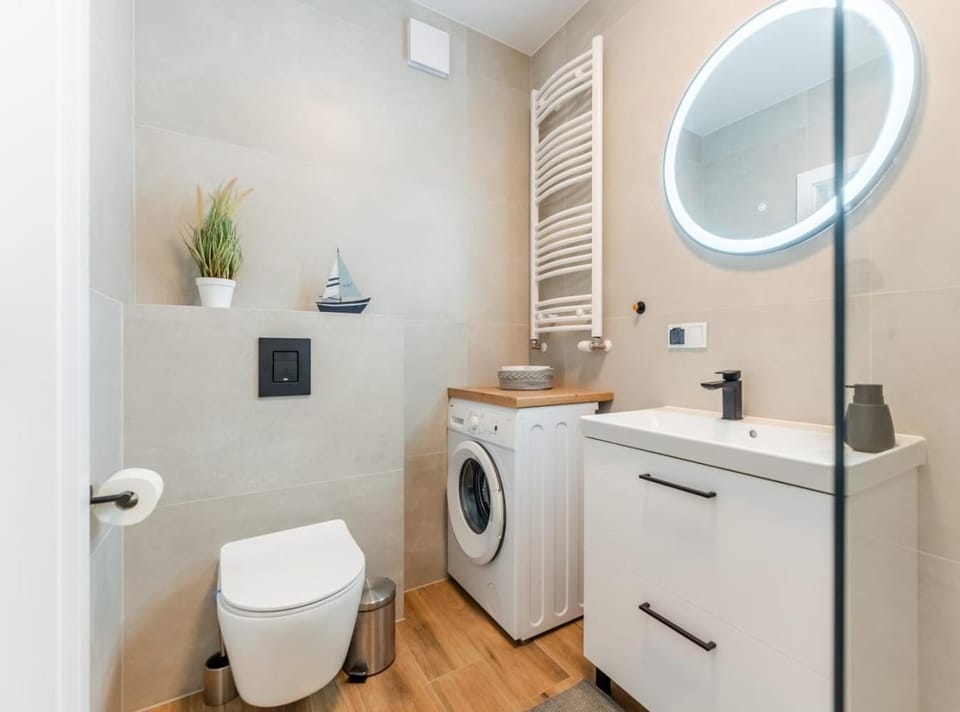 Toilet, Bathroom, towels, washing machine, dryer