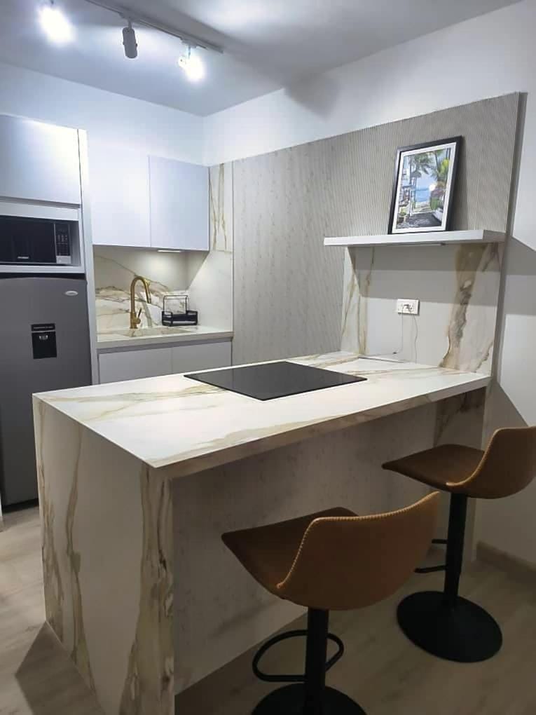 Kitchen or kitchenette, stove