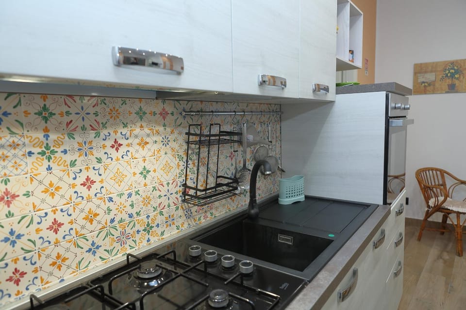 Kitchen or kitchenette, stove