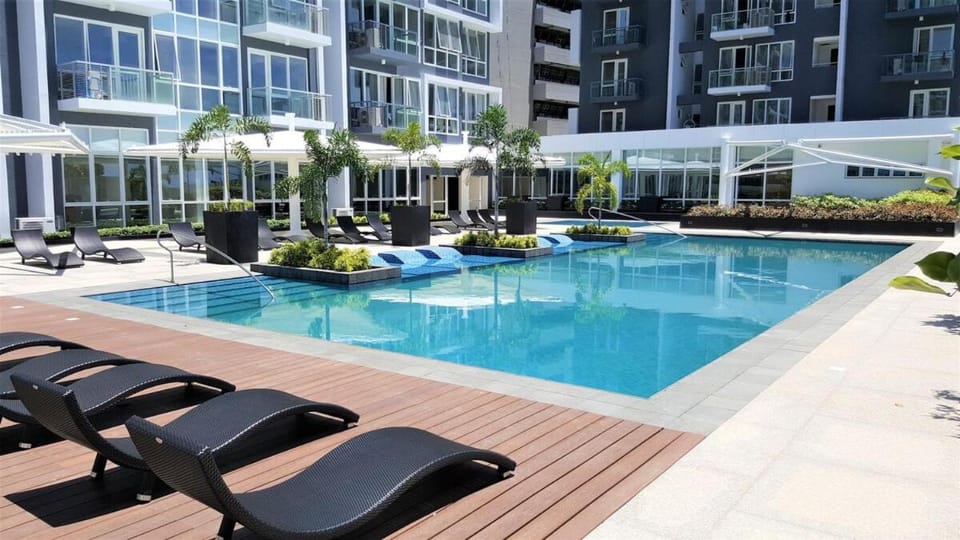 Minimalist 1BR Mactan Newtown Suite w Pool Apartment in Lapu-Lapu City