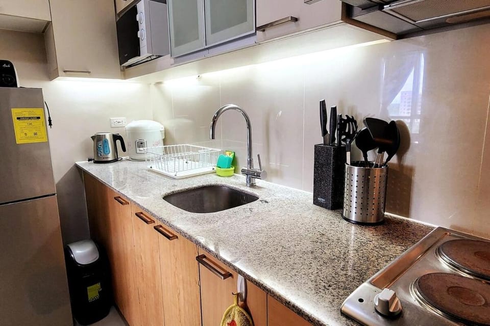 Minimalist 1BR Mactan Newtown Suite w Pool Apartment in Lapu-Lapu City