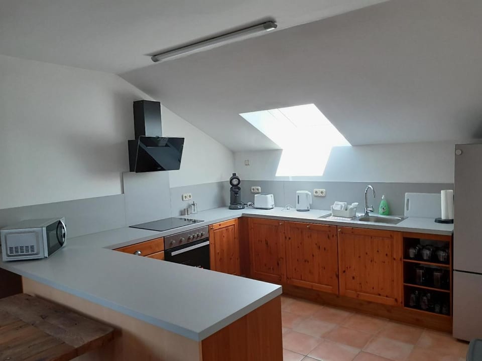 Kitchen or kitchenette, oven, stove, toaster