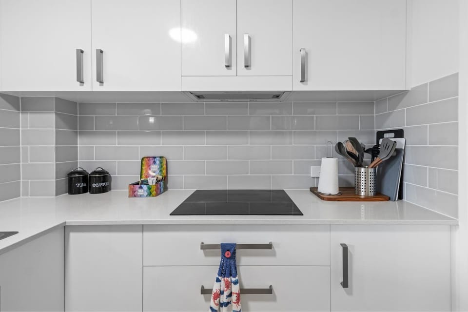 Kitchen or kitchenette, stove, toaster