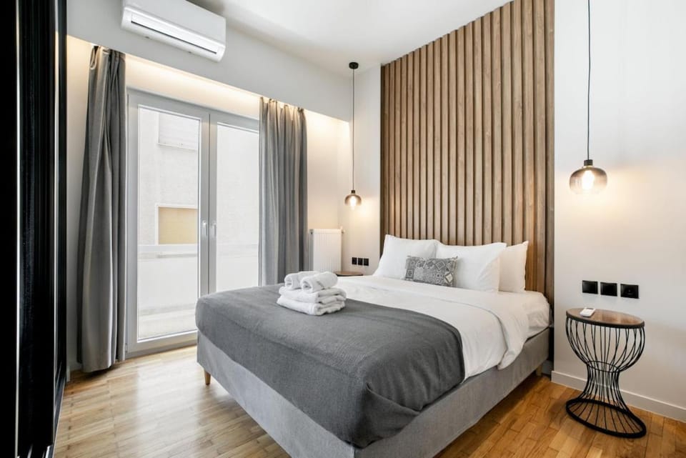 Bed, Photo of the whole room, Bedroom, towels, air conditioner