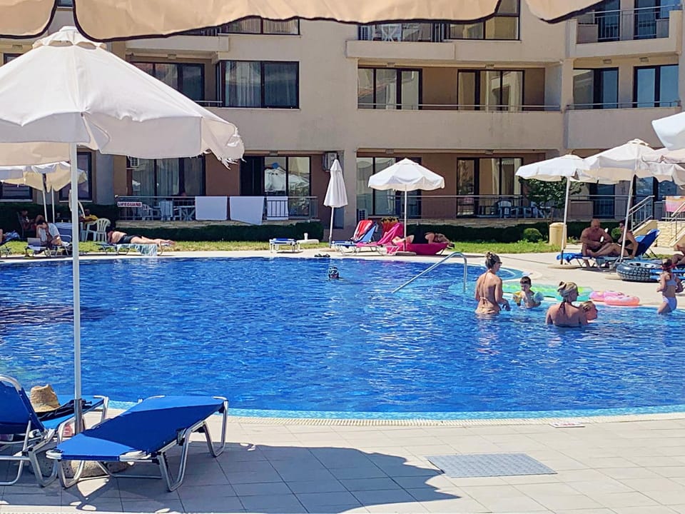 Property building, Day, Pool view, Swimming pool, children, group of guests, sunbed