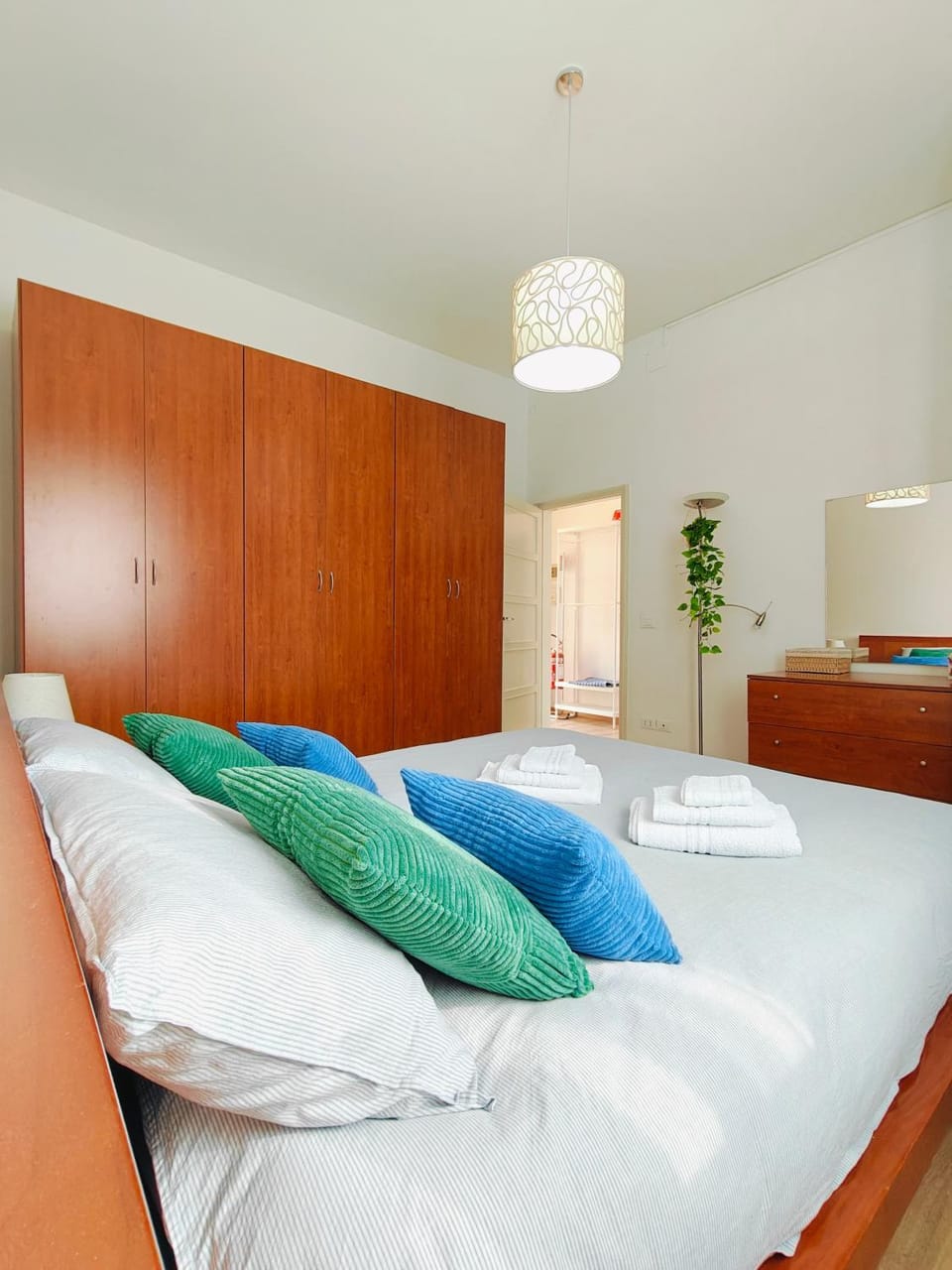 Bed, Photo of the whole room, towels, wardrobe