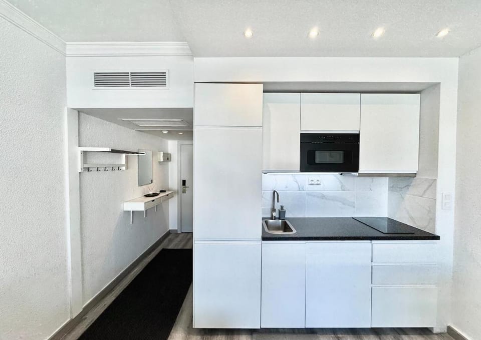 Kitchen or kitchenette, stove