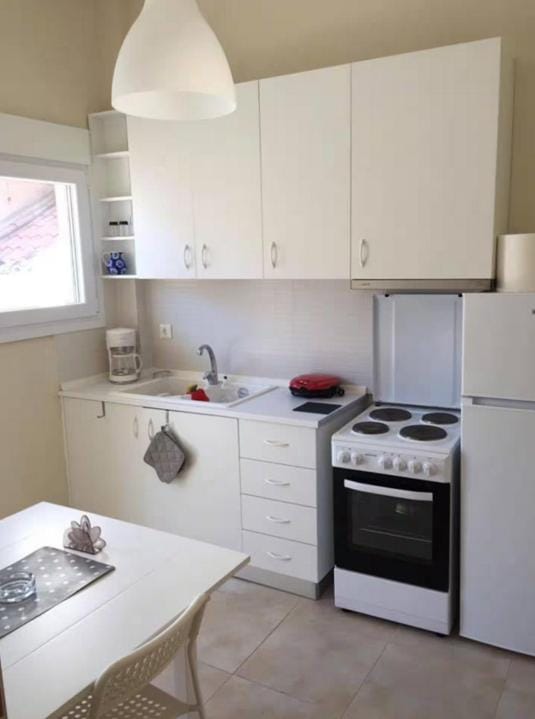 Kitchen or kitchenette, oven, stove