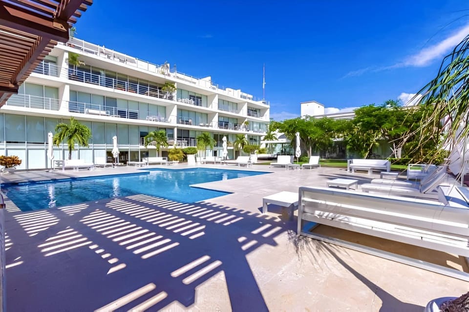 Property building, Day, View (from property/room), Pool view, Swimming pool, sunbed