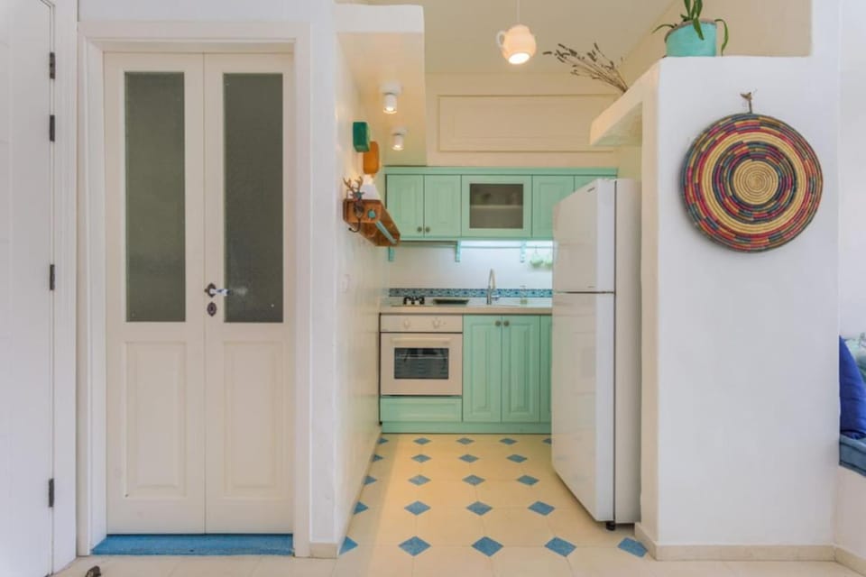 Kitchen or kitchenette, oven, stove