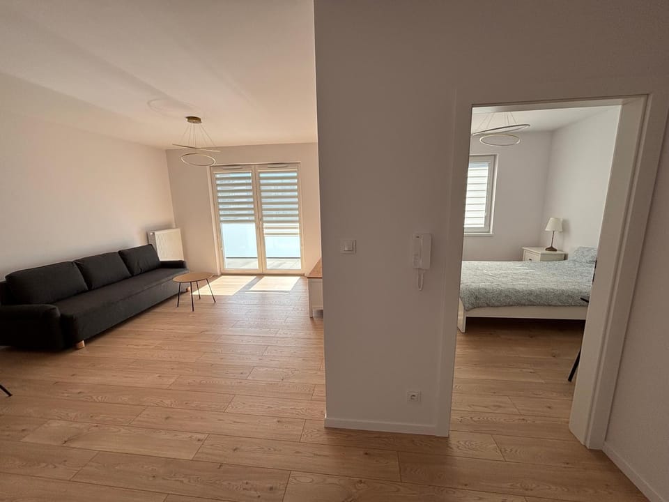 Bed, Living room, Seating area, Bedroom