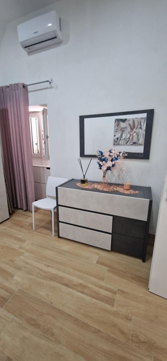 Photo of the whole room, air conditioner