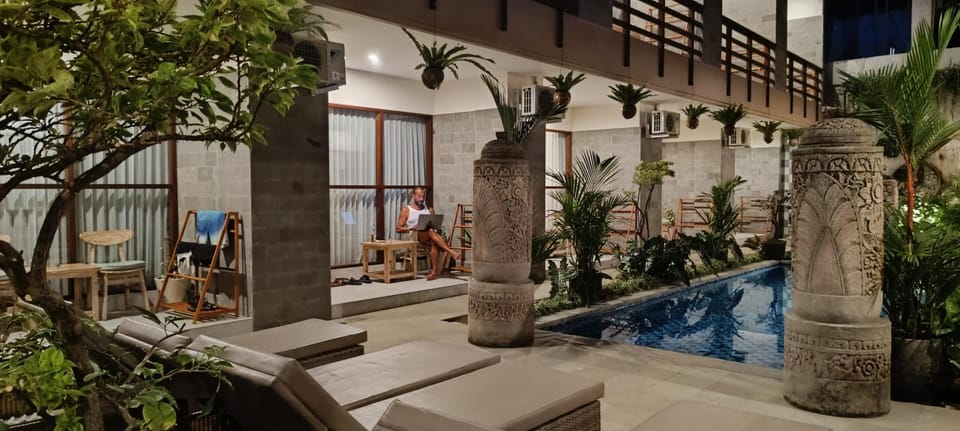Property building, Seating area, Pool view, Swimming pool, sunbed