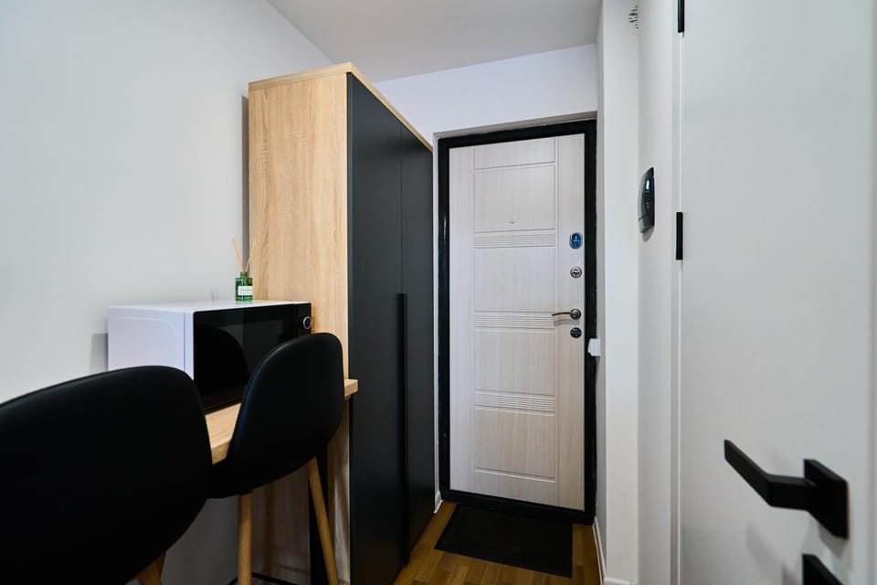Dining area, microwave, wardrobe