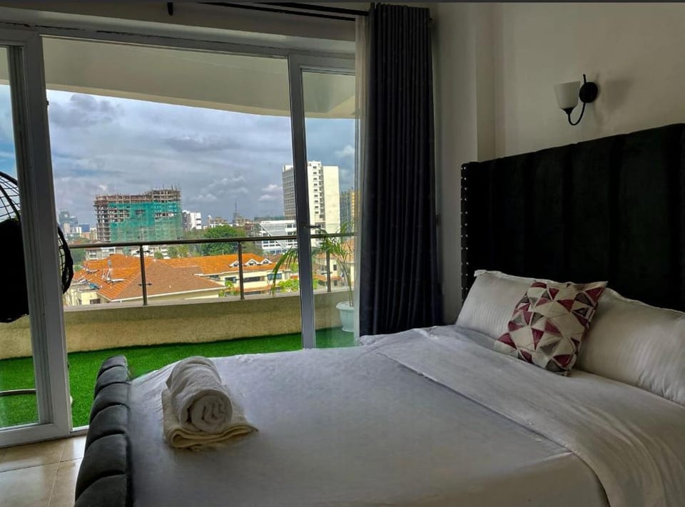 newly furnished two bedroom apartment with swimming pool, fully equipped gym, private parking space,children playground and unbeatable scenic city views Apartment in Nairobi