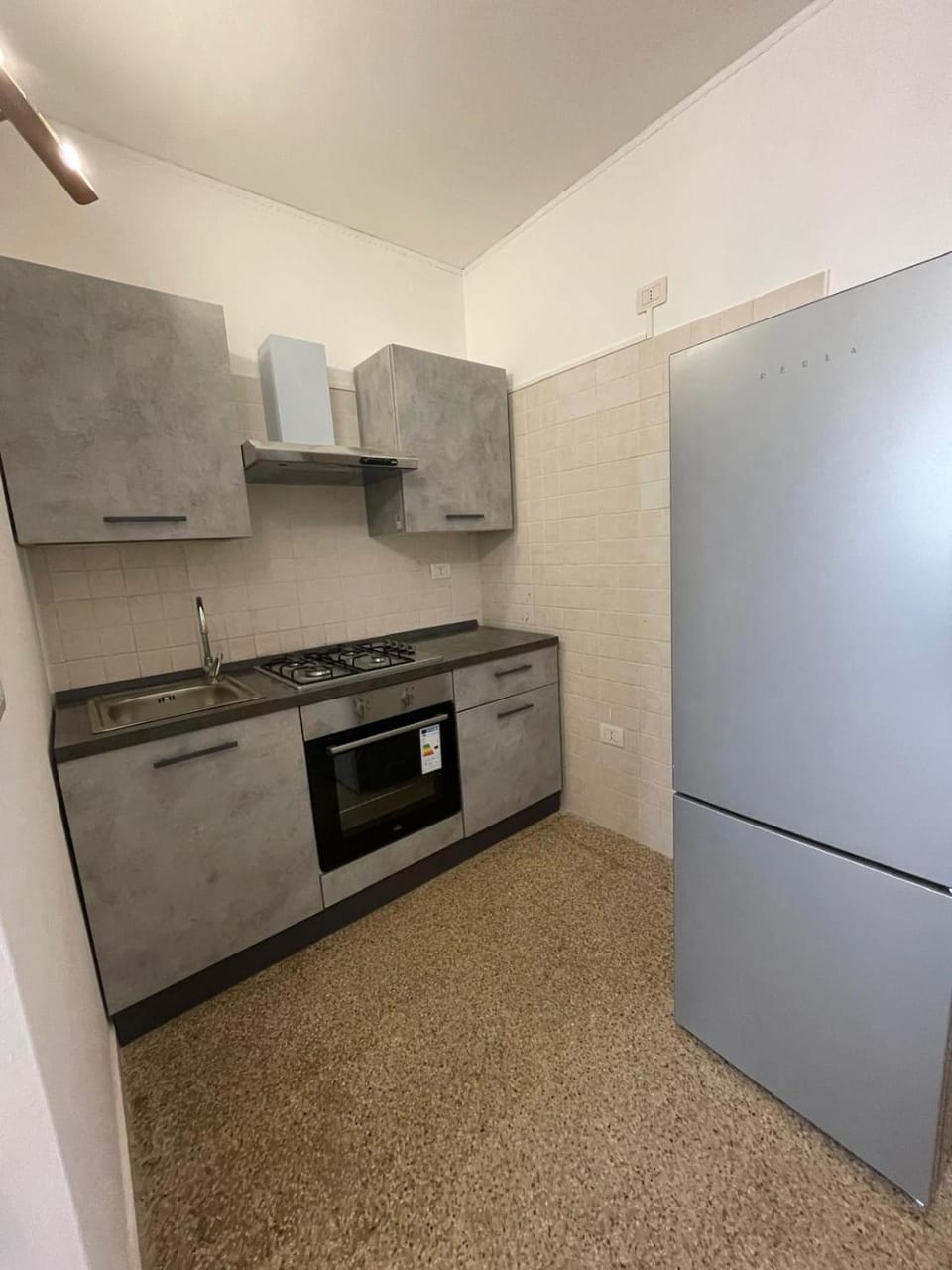 Kitchen or kitchenette, oven