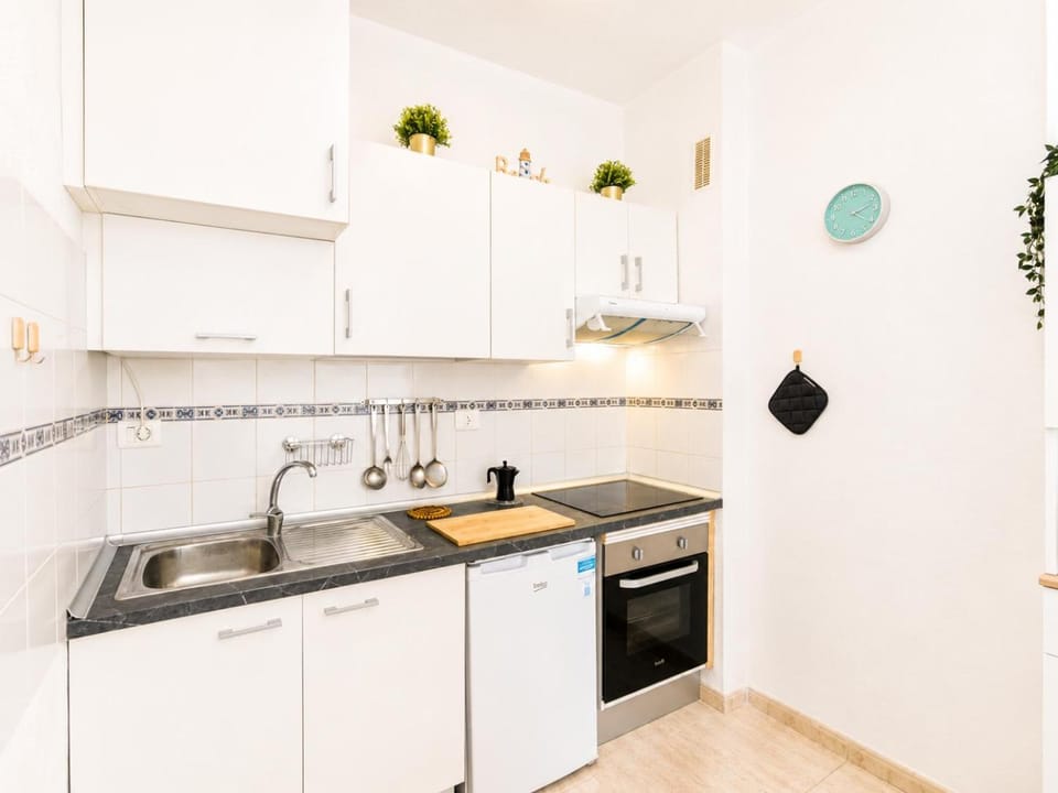 Kitchen or kitchenette, stove