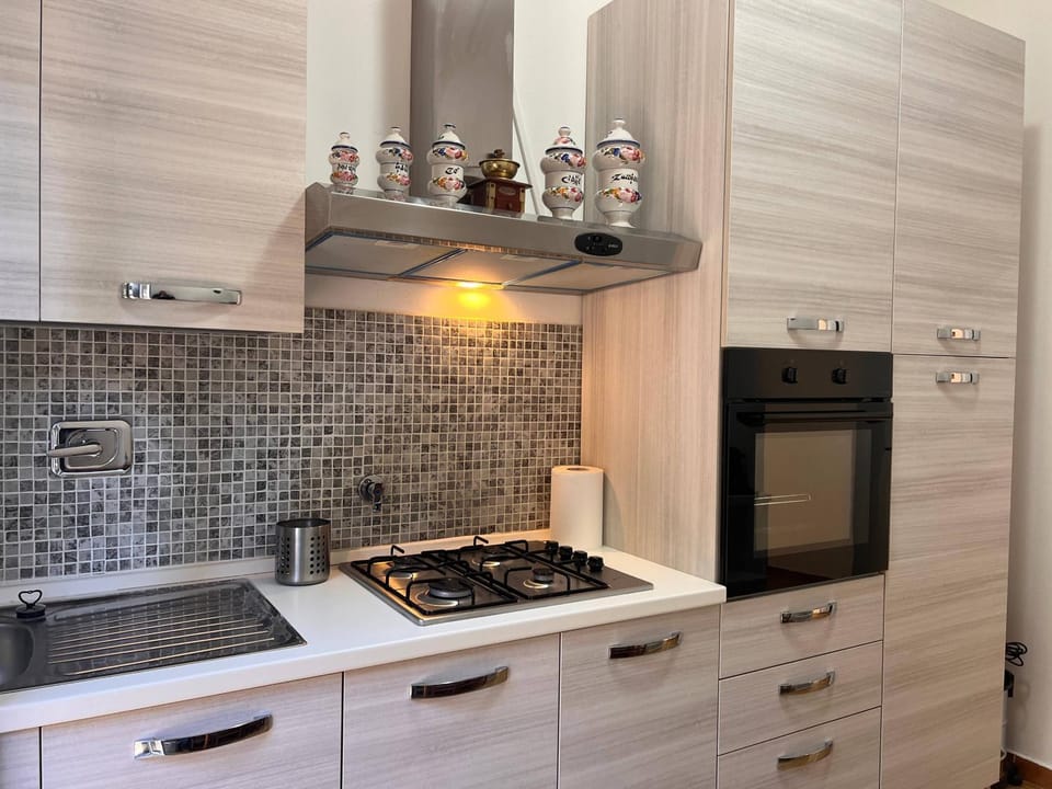 Kitchen or kitchenette, oven, stove