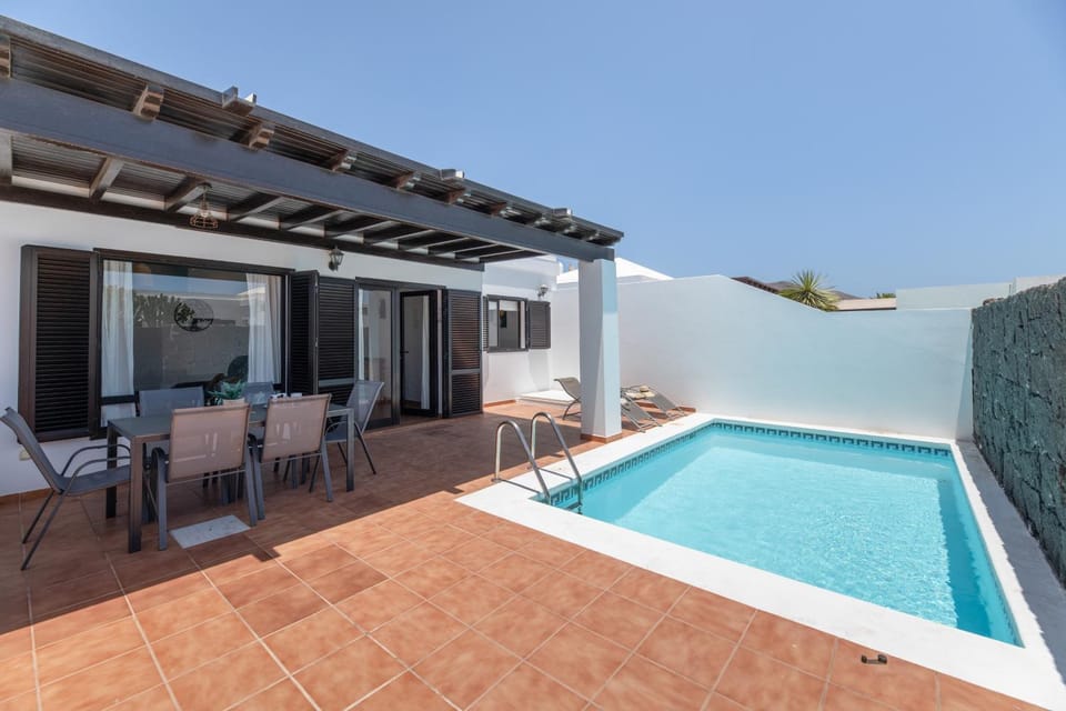 Property building, Living room, Swimming pool
