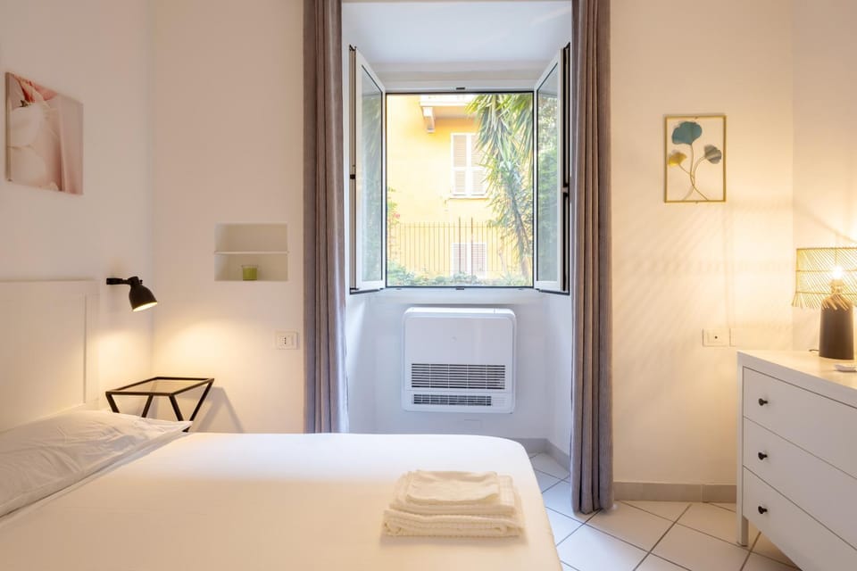Bed, Photo of the whole room, Bedroom, towels, air conditioner