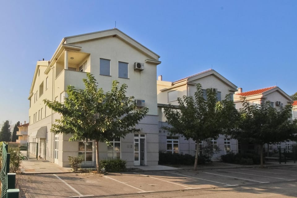 Property building, Day, Parking