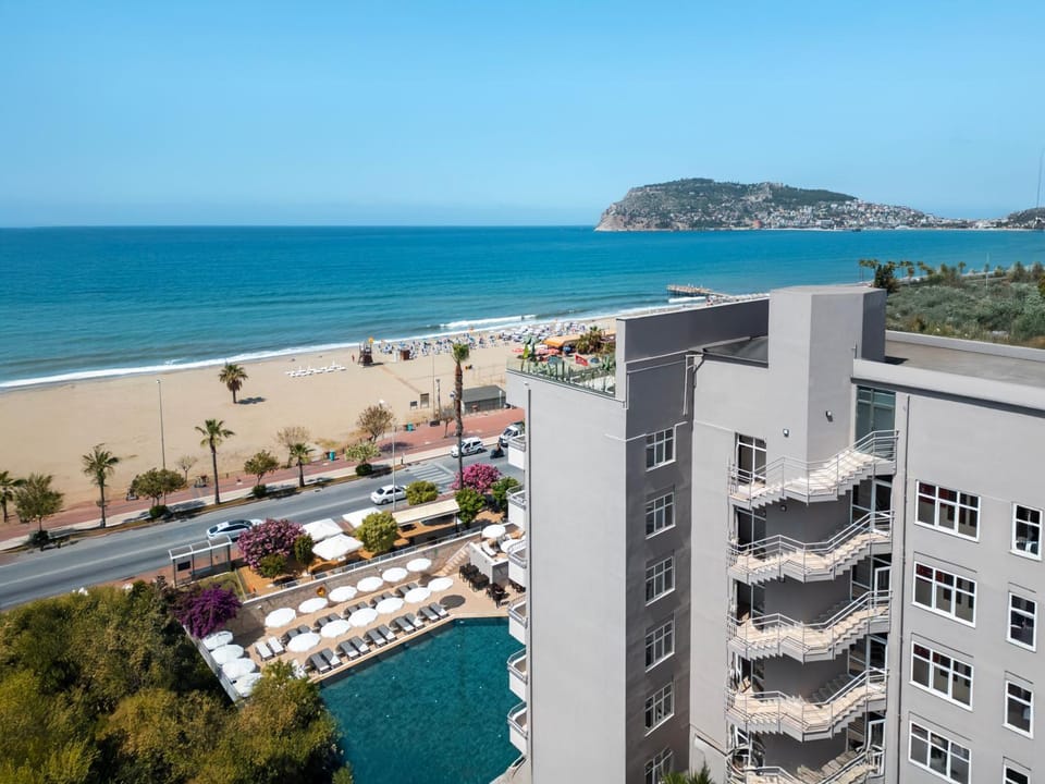 Property building, Nearby landmark, Day, Natural landscape, Bird's eye view, Beach, City view, Pool view, Sea view, Swimming pool