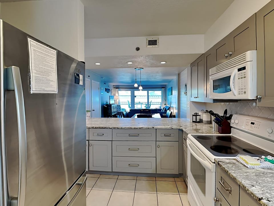 Kitchen or kitchenette, microwave, oven, stove, kitchen