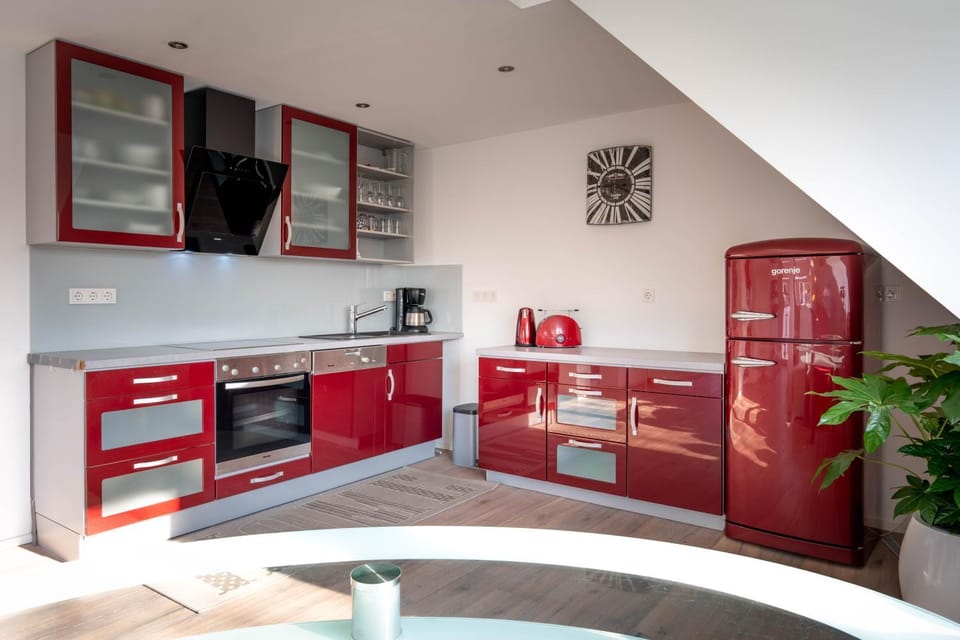 Kitchen or kitchenette, dishwasher, oven, stove, toaster, kitchen
