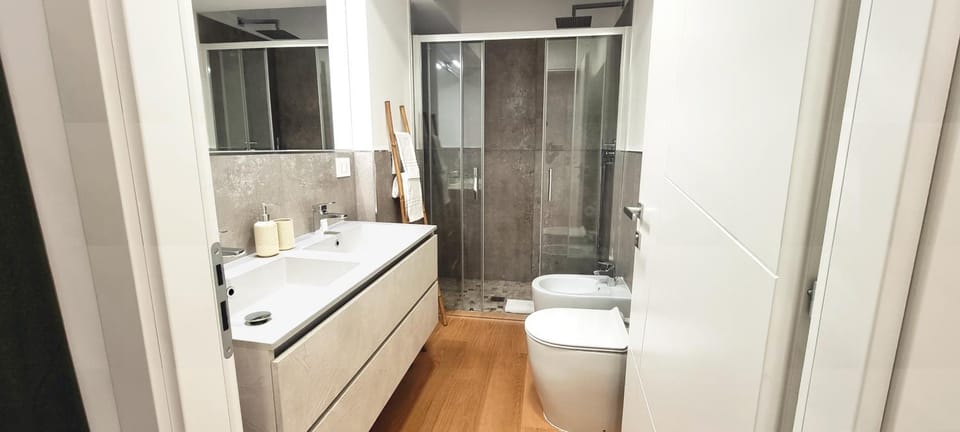 Shower, Toilet, Bathroom, bidet, heating, towels, air conditioner