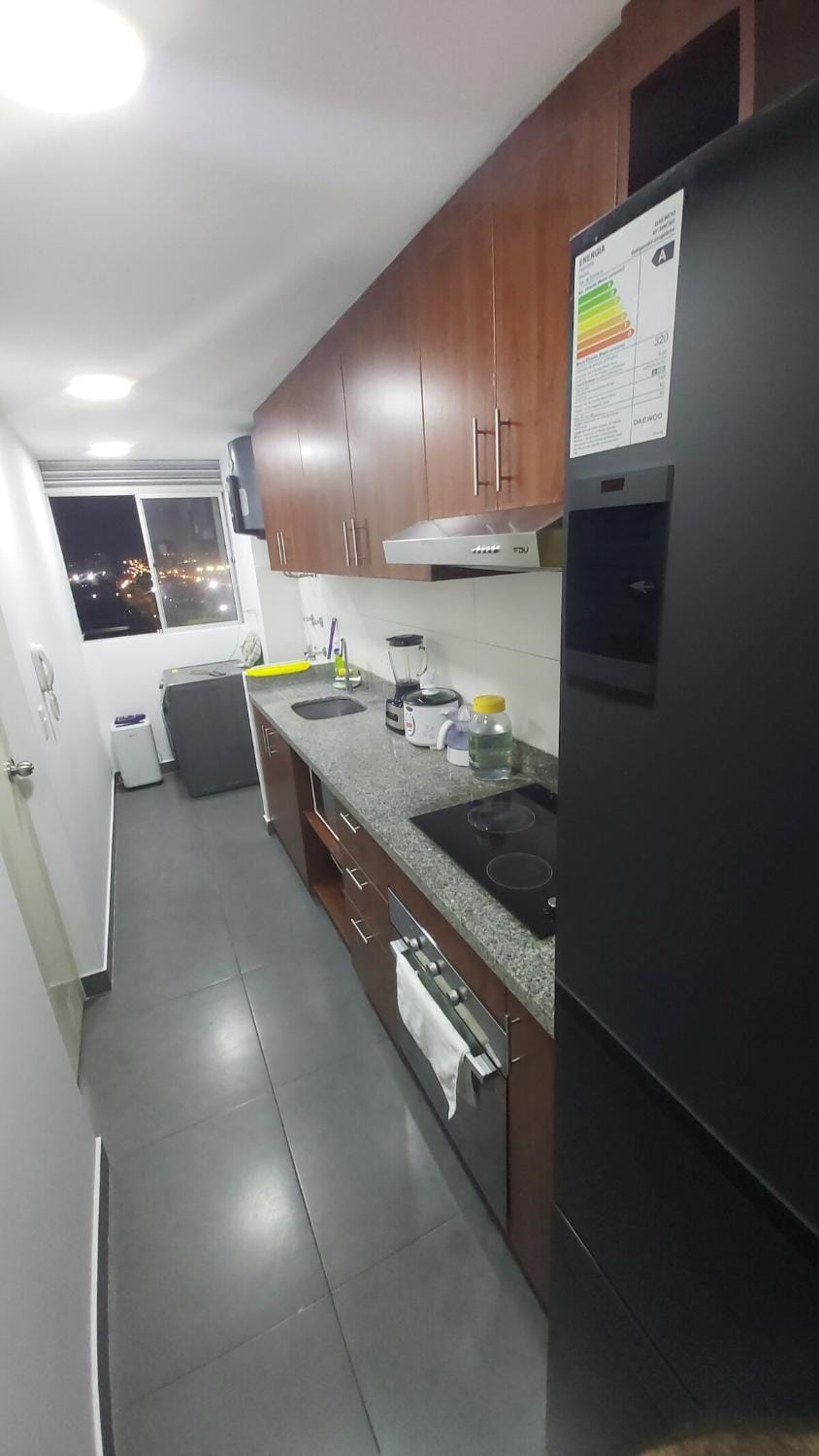 Kitchen or kitchenette, dishwasher, oven