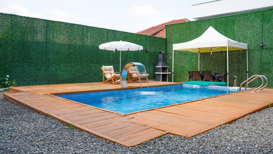 Property building, Day, Pool view, Swimming pool, sunbed