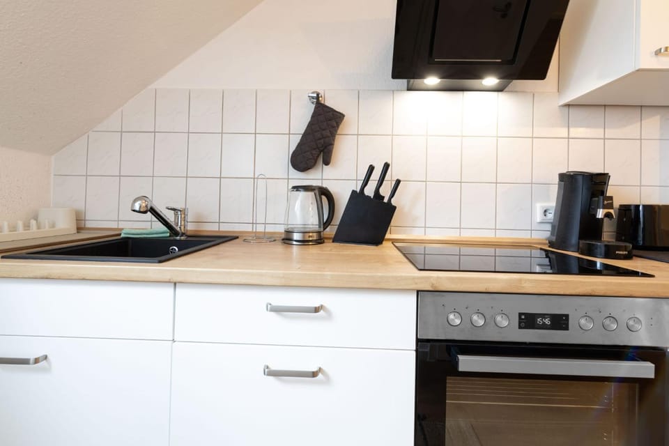 Kitchen or kitchenette, stove, toaster