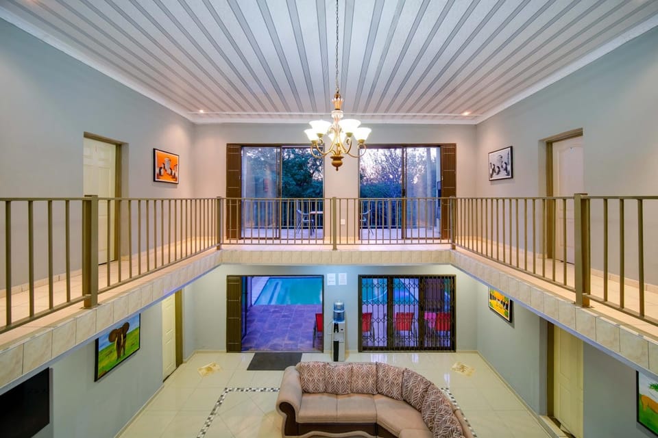 Living room, Seating area, Pool view