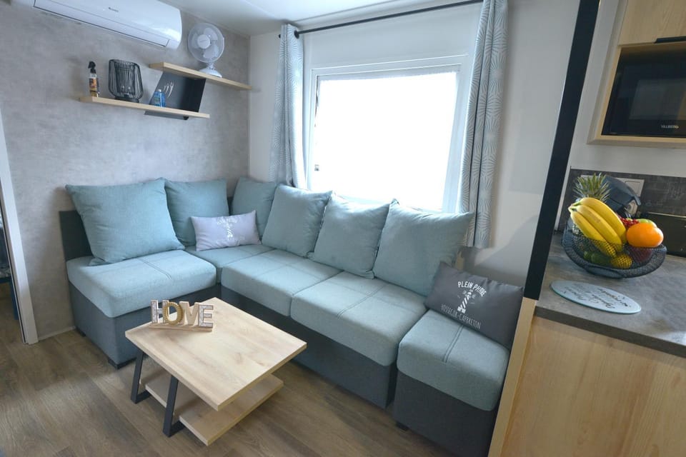 Living room, Seating area, heating, microwave, air conditioner