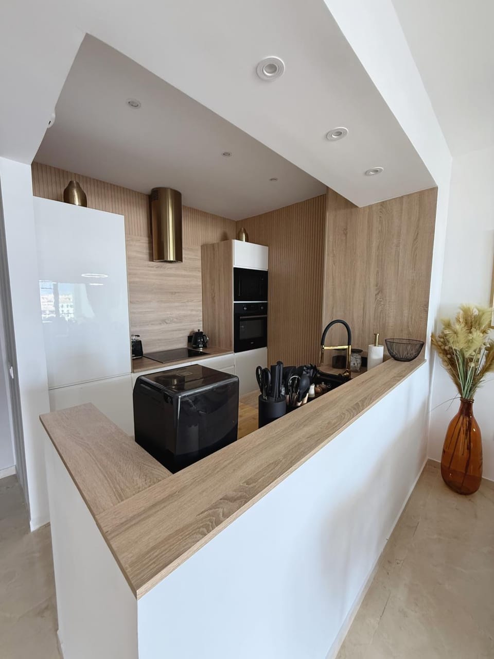 Kitchen or kitchenette, dishwasher, oven, stove, toaster