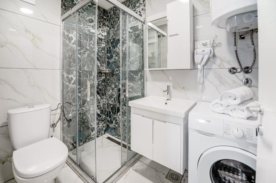 Shower, Toilet, Bathroom, Bath, towels, washing machine, dryer