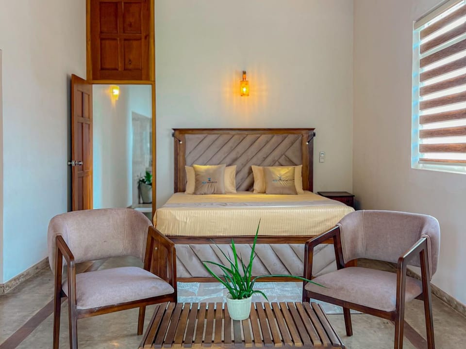 Bed, Seating area, Bedroom