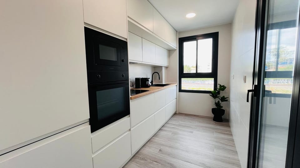 Kitchen or kitchenette, oven