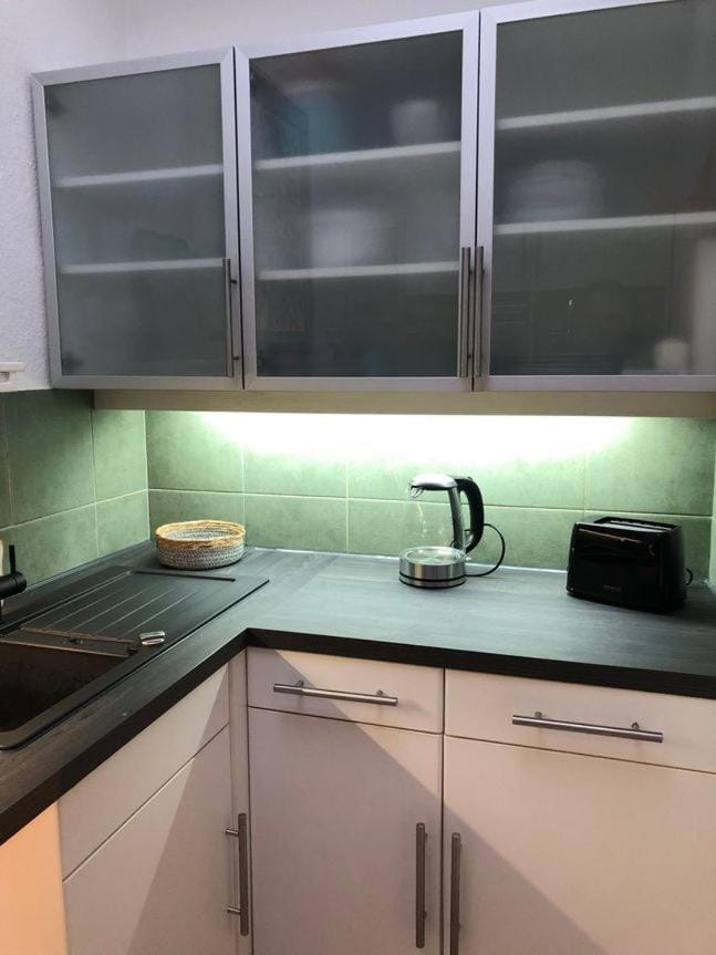 Kitchen or kitchenette, stove, kitchen
