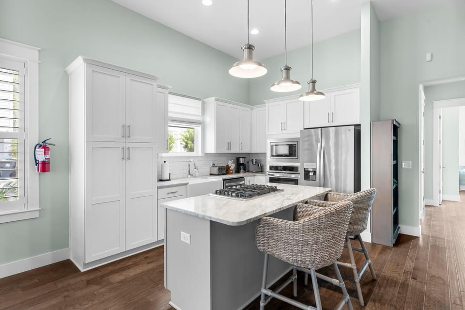 Kitchen or kitchenette, dishwasher, oven, stove, toaster