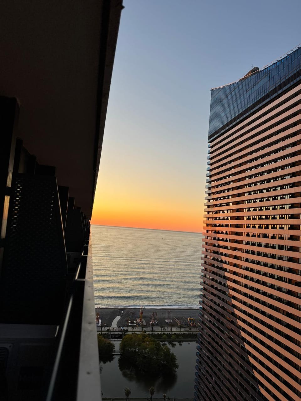 Property building, Day, Natural landscape, Sea view, Sunset