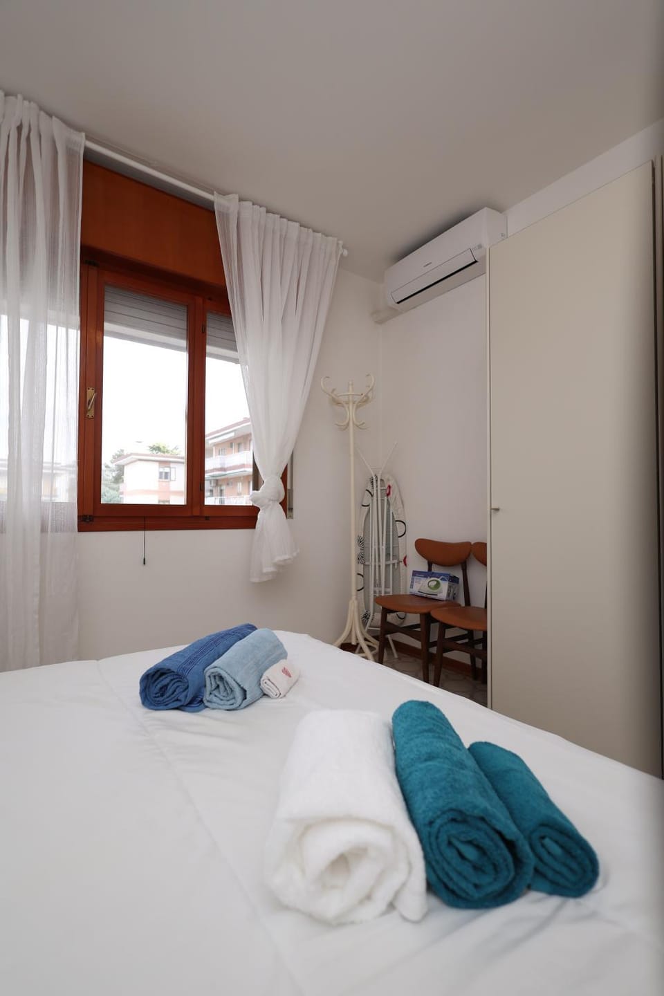 Bed, Photo of the whole room, Bedroom, towels, air conditioner