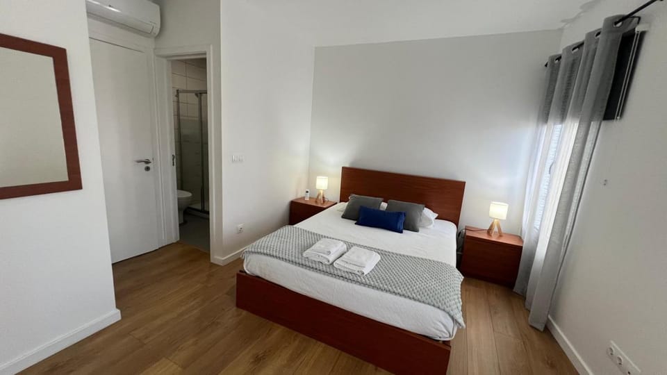Bed, Bedroom, towels, wardrobe, air conditioner