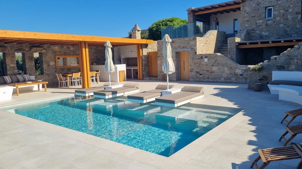 Property building, Patio, Swimming pool, sunbed