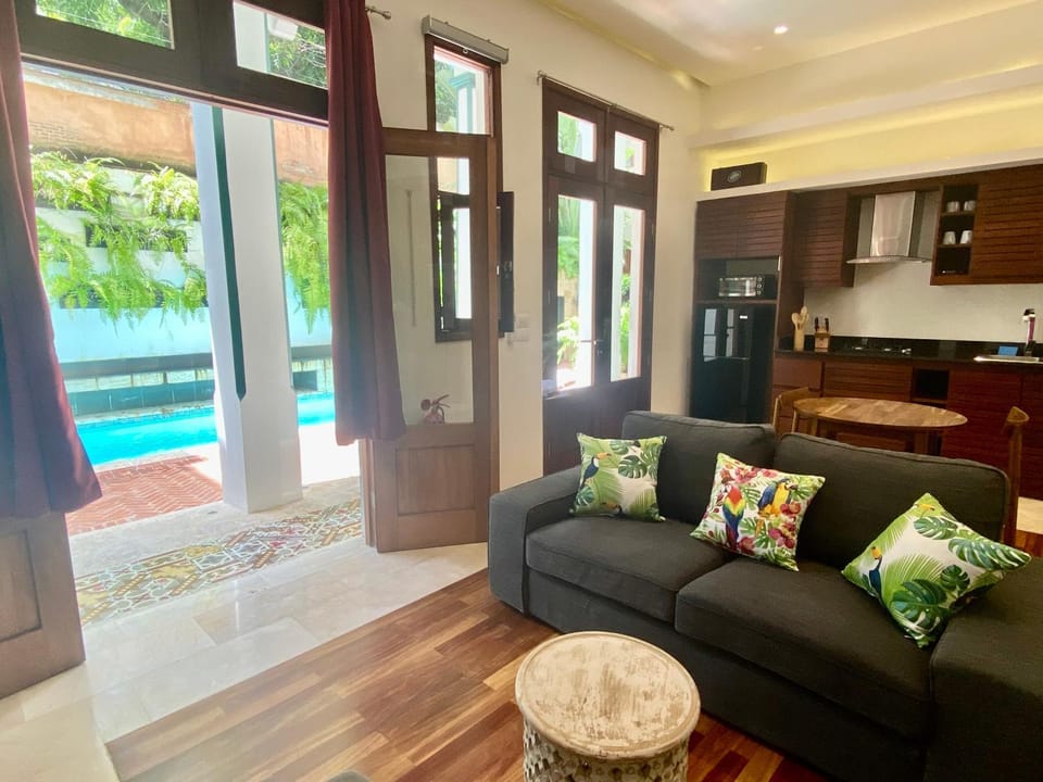 Kitchen or kitchenette, Living room, Seating area, Pool view, Swimming pool
