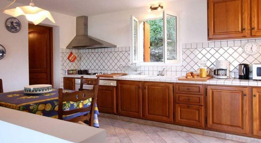 Kitchen or kitchenette, dishwasher, stove, toaster